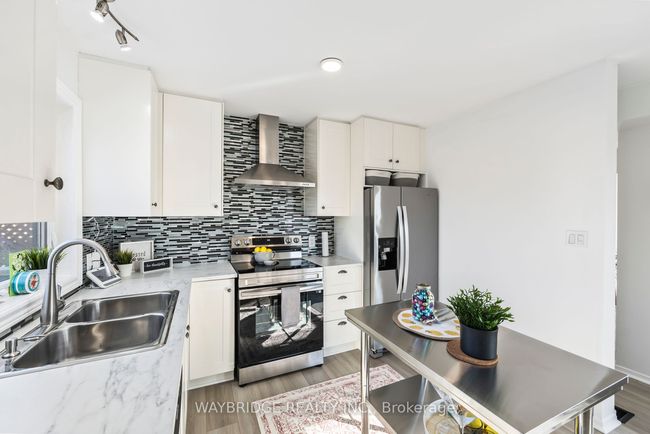 24 Mckeown Cres, House attached with 3 bedrooms, 2 bathrooms and 4 parking in Amherstview ON | Image 27
