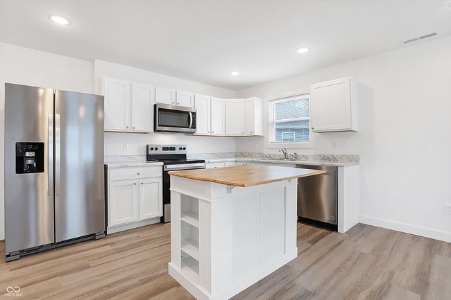 ***Photos are of completed unit 1501 Coen Ct, similar layout.*** | Image 8