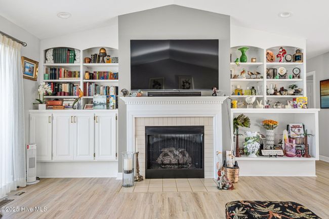 Fireplace with built in shelves and cabinets | Image 8