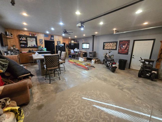 Over 800 sq ft. LP heater, wood stove, storage, workshop | Image 56