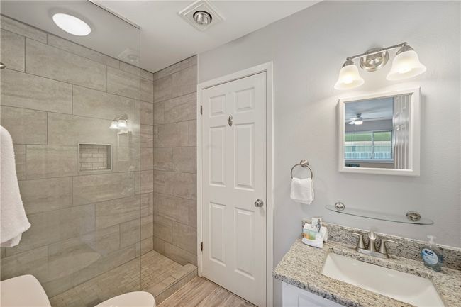 Tiled shower in the bathroom | Image 11