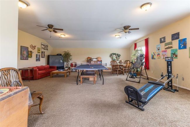 The studio is ~ 750sf and features a full bath and central HVAC. Abundant natural light. The owners are currently using this as a staging area for their upcoming move. Please excuse the boxes. | Image 46
