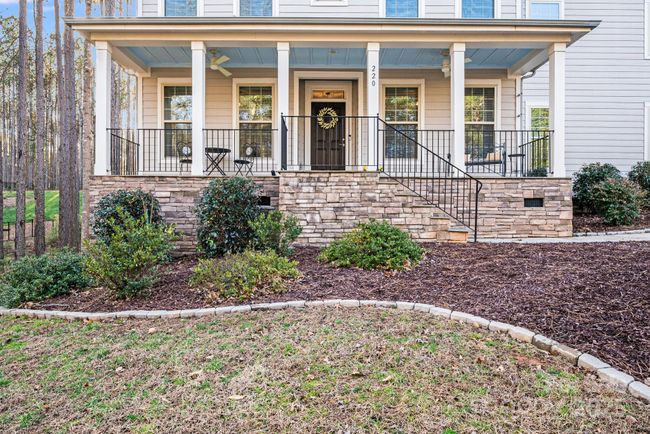 Fall in love with the front porch and enjoy seasonal lake views! | Image 39