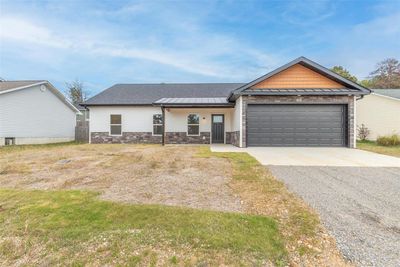 View of front of property with a garage | Image 1