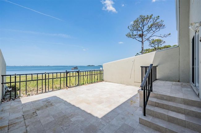Private Fenced Waterfront Patio | Image 4