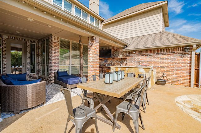 View of patio featuring outdoor dining area and an outdoor living space | Image 34