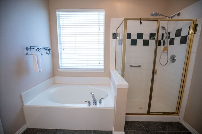 Primary bath with a garden tub & a shower stall | Image 14