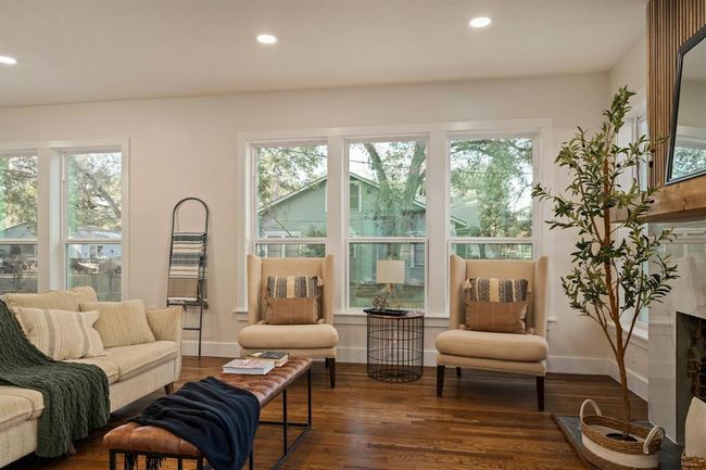 Abundant natural light pours in through large windows, enhancing the home’s spacious and airy feel. | Image 4