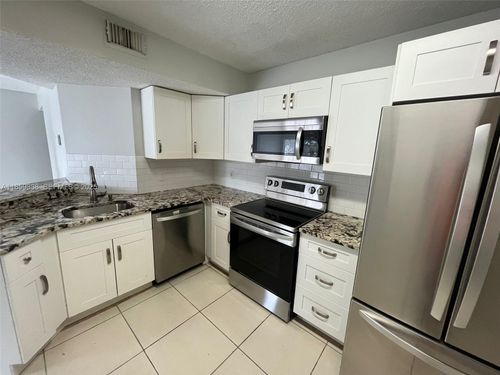 203-8821 Wiles Rd, Coral Springs, FL, 33067-1850 | Card Image