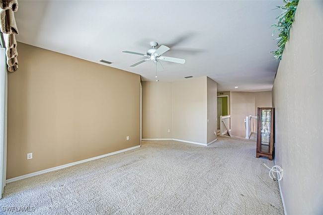Carpeted empty room with ceiling fan | Image 20