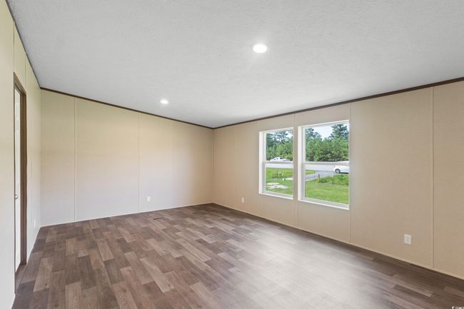 Unfurnished room featuring wood finished floors and recessed lighting | Image 19