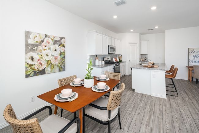 Dining space featuring light wood-style floors, recessed lighting, and baseboards | Image 11