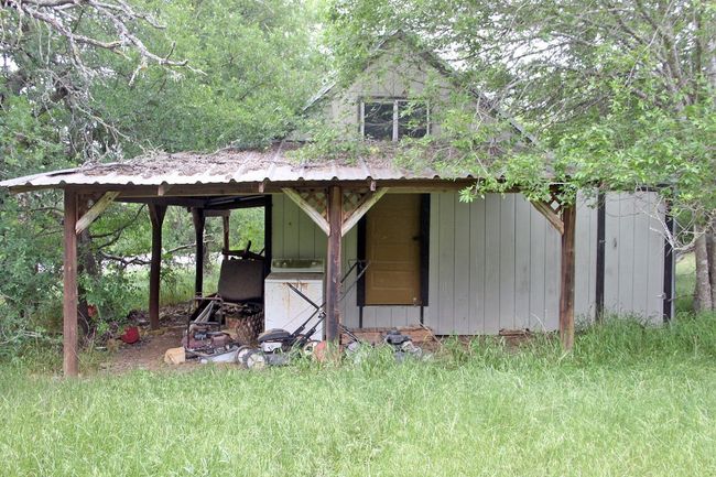 View of outdoor structure with an outbuilding | Image 19