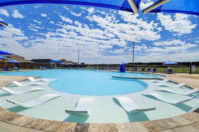 Relax and rejuvenate in the resort style pool at the Community Amenities Center in Harrington Trails! | Image 37