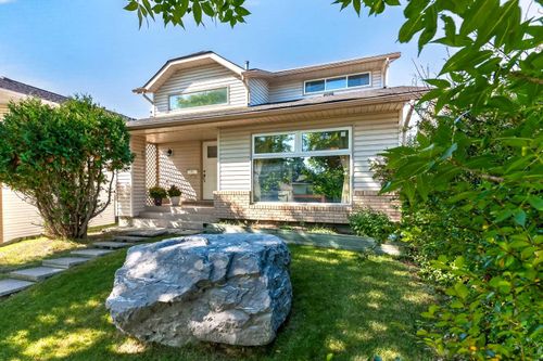 7 Woodbrook Way Sw, House with 4 bedrooms, 3 bathrooms and 2 parking in Calgary AB | Card Image