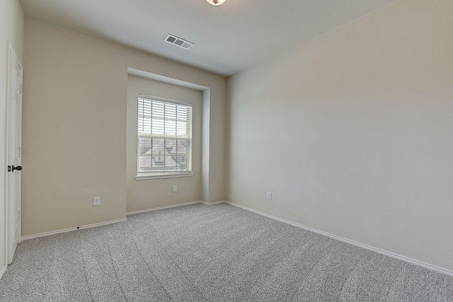 Carpeted empty room with baseboards | Image 20