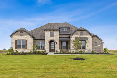 View of front facade with a front yard | Image 1