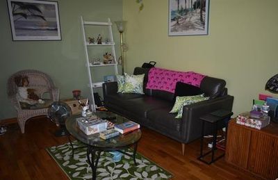 Living room featuring dark hardwood / wood-style flooring | Image 2