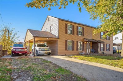 Front of house. Yes the carport is BIG | Image 2