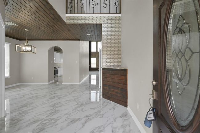 Entry way, view from the front door. All new paint through out the house. | Image 5