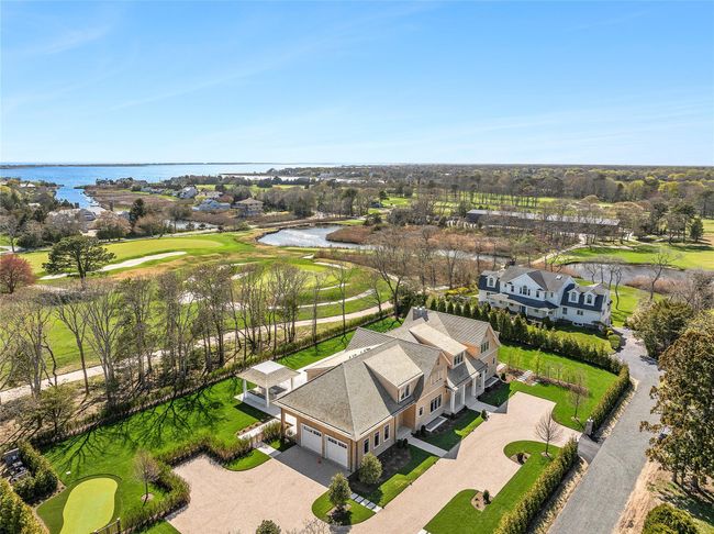 Bird's eye view with a water view, golf course view, and a residential view | Image 44