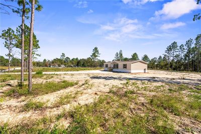 13090 Se 21 Place, House other with 3 bedrooms, 2 bathrooms and null parking in Morriston FL | Image 2