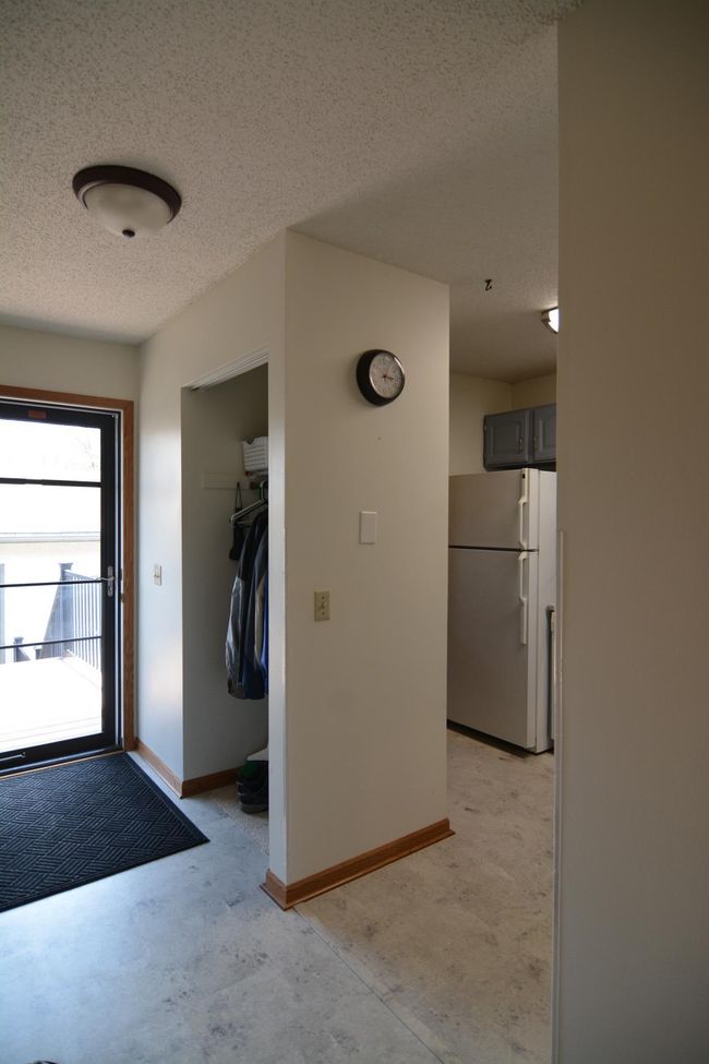 Living room toward dining area | Image 6