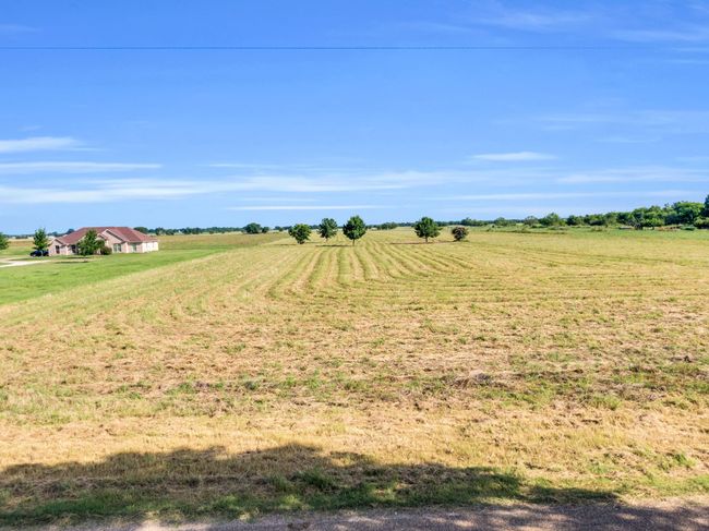 View of yard with a view of countryside | Image 9