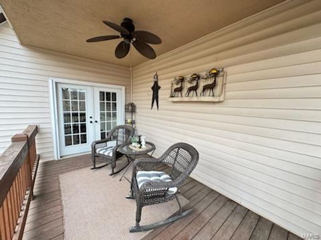Cover deck off of breakfast nook in kitchen. | Image 15