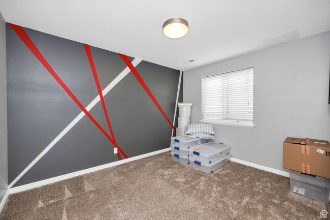 Bedroom with baseboards, carpet flooring, and visible vents | Image 30