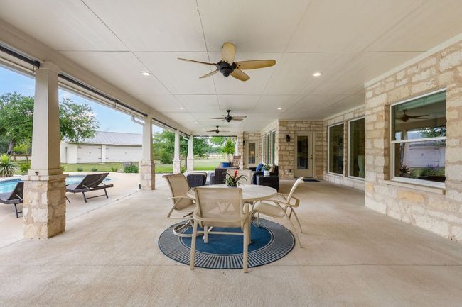 Whether enjoying a quiet evening or hosting friends, the back patio seamlessly connects indoor and outdoor living. | Image 31