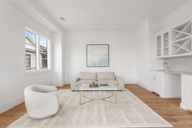 The spacious fourth-floor game room offers the perfect flexible layout—ideal for a media lounge, playroom, or entertaining hub. | Image 32