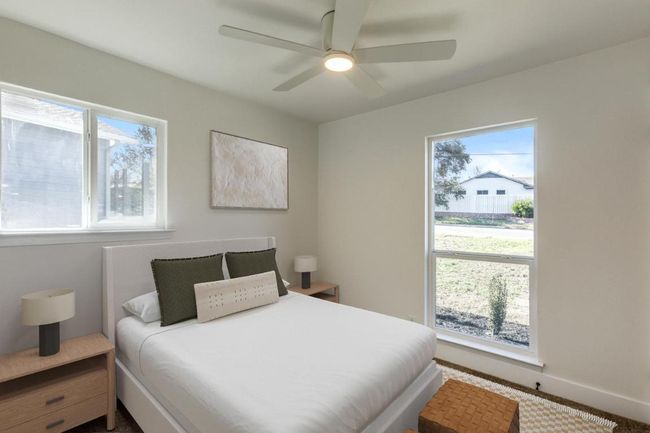 Bedroom featuring a ceiling fan and baseboards | Image 6