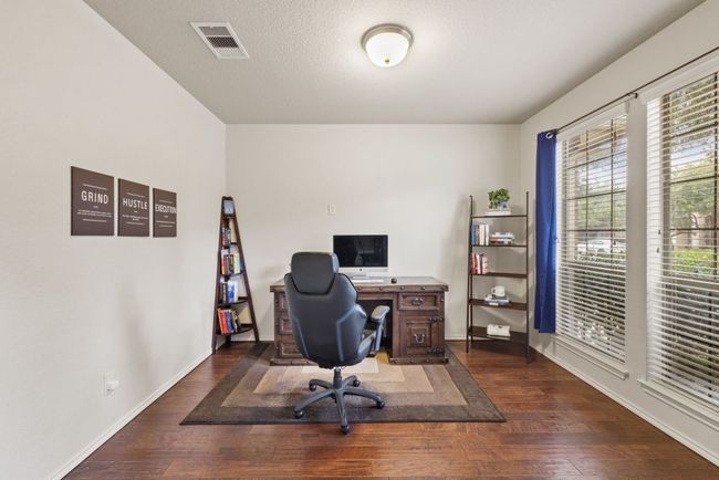 Office featuring wood-type flooring and baseboards | Image 6