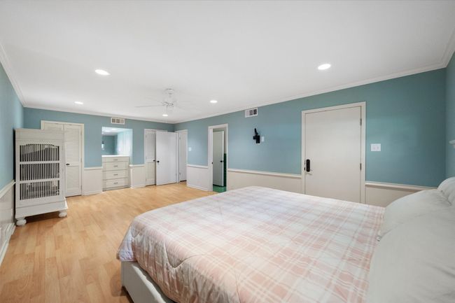 Large third bedroom with double closets and built-in cabinet | Image 28