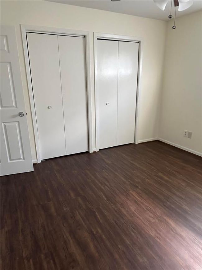 Double closet doors in East bedroom | Image 17