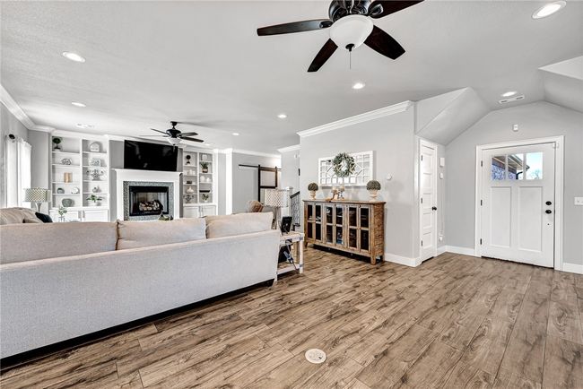 Enough space to have a game table or even a dining table and still use the formal dining as an office. | Image 13