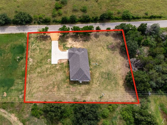 Aerial overview of property's location with property parcel outlined | Image 33