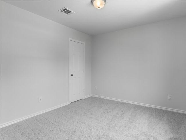 Upstairs 4th bedroom with cozy carpet flooring. | Image 16