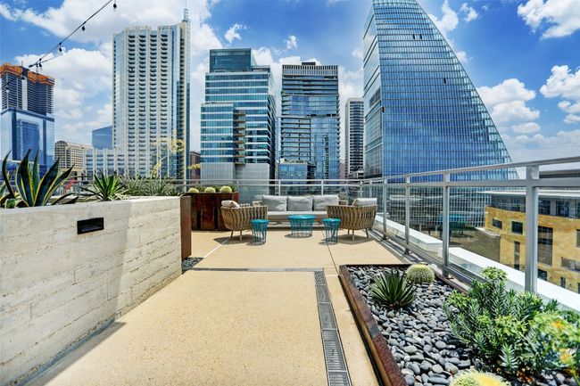 View of patio / terrace featuring a view of city and outdoor lounge area | Image 18