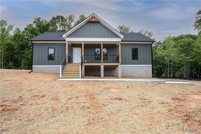 Welcome home to 10500 Cross County Road! Trim/soffit will be black. | Image 1