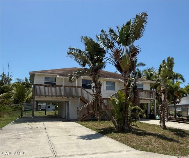 5615 Birdsong Ln, Home with 4 bedrooms, 2 bathrooms and null parking in BOKEELIA FL | Image 4