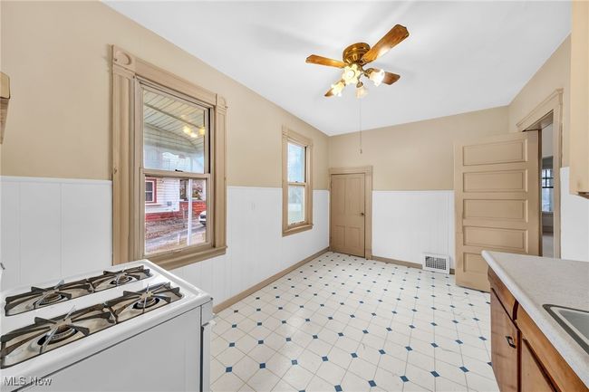 7609 Denison Ave, Home with 5 bedrooms, 2 bathrooms and null parking in Cleveland OH | Image 4