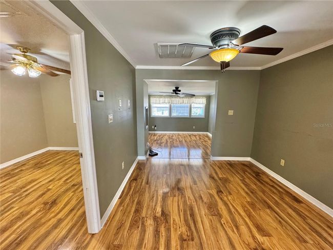 View from Kitchen to dinette area, bedroom #2 and living room | Image 6