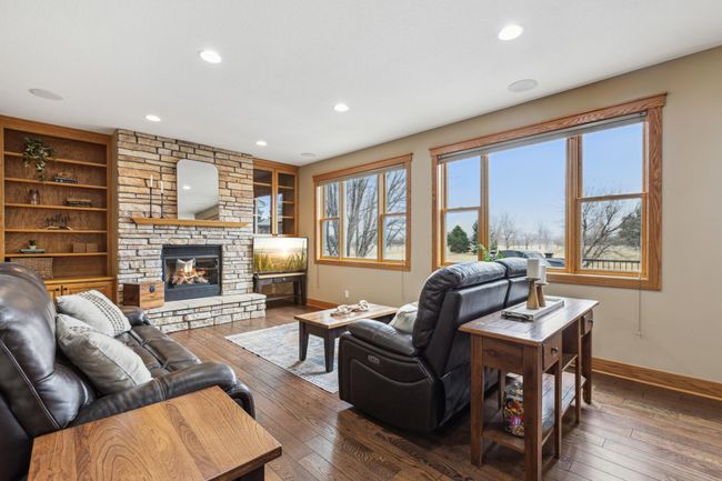 Custom Stone Fireplace, gorgeous hard wood floors | Image 9