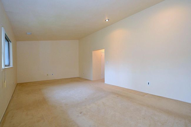 Empty room featuring light carpet | Image 11