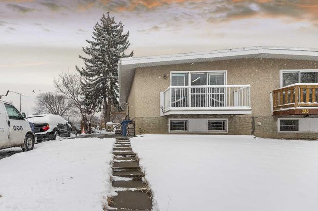 61 Huntford Close Ne, Home with 2 bedrooms, 1 bathrooms and 2 parking in Calgary AB | Image 1