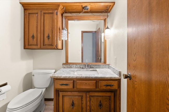 Bathroom with toilet and vanity | Image 29