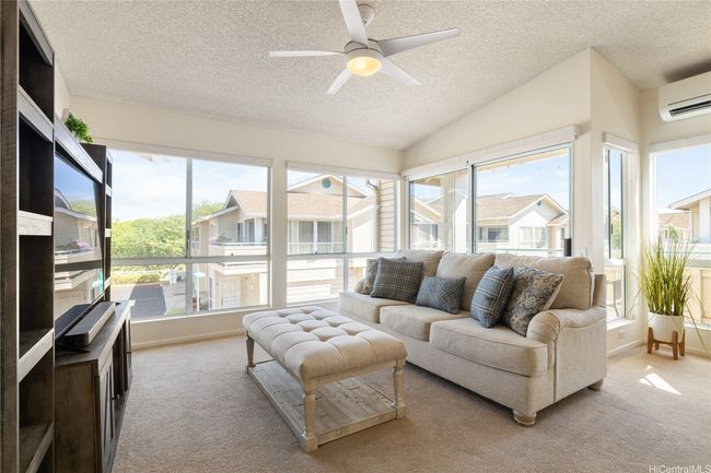 Vaulted ceilings and large oversized windows provide a light, airy feel, making the 1, 010 sf feel even more spacious! | Image 10