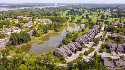 9838 Hawthorne Glen Drive, Condo with 4 bedrooms, 2 bathrooms and null parking in Grosse Ile Twp MI | Image 1